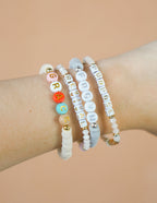 Set of colorful Elevated Faith Christian Jewelry Bracelet with beads spelling Grace, Revival, and Purpose