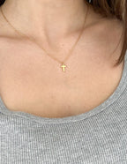 Gold Cross Necklace from Elevated Faith, a beautiful piece of Christian Jewelry for everyday wear