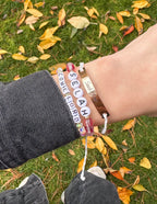 Elevated Faith Christian Jewelry Bracelet with personalized beads and gold accent on a wrist