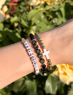 Stacked Elevated Faith Christian Jewelry Bracelet featuring beads and a cross with inspirational messages