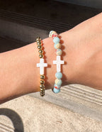 Elevated Faith Christian Jewelry Bracelet featuring colorful stones and white cross beads