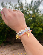 Elevated Faith Christian Jewelry Bracelet featuring colorful beads and a cross charm
