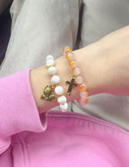 Elevated Faith Christian Jewelry Bracelet featuring colorful stone beads and gold charms