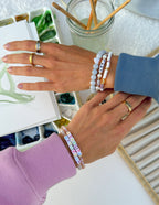 Elevated Faith Christian Jewelry Bracelet displayed with multiple stone bracelets on two wrists