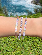 Elevated Faith Christian Jewelry Bracelet set with letters spelling Prosper, Heart of Gold, and Miracles