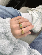 Elevated Faith Christian Jewelry Ring with Green Stone and Gold Accent on Hand