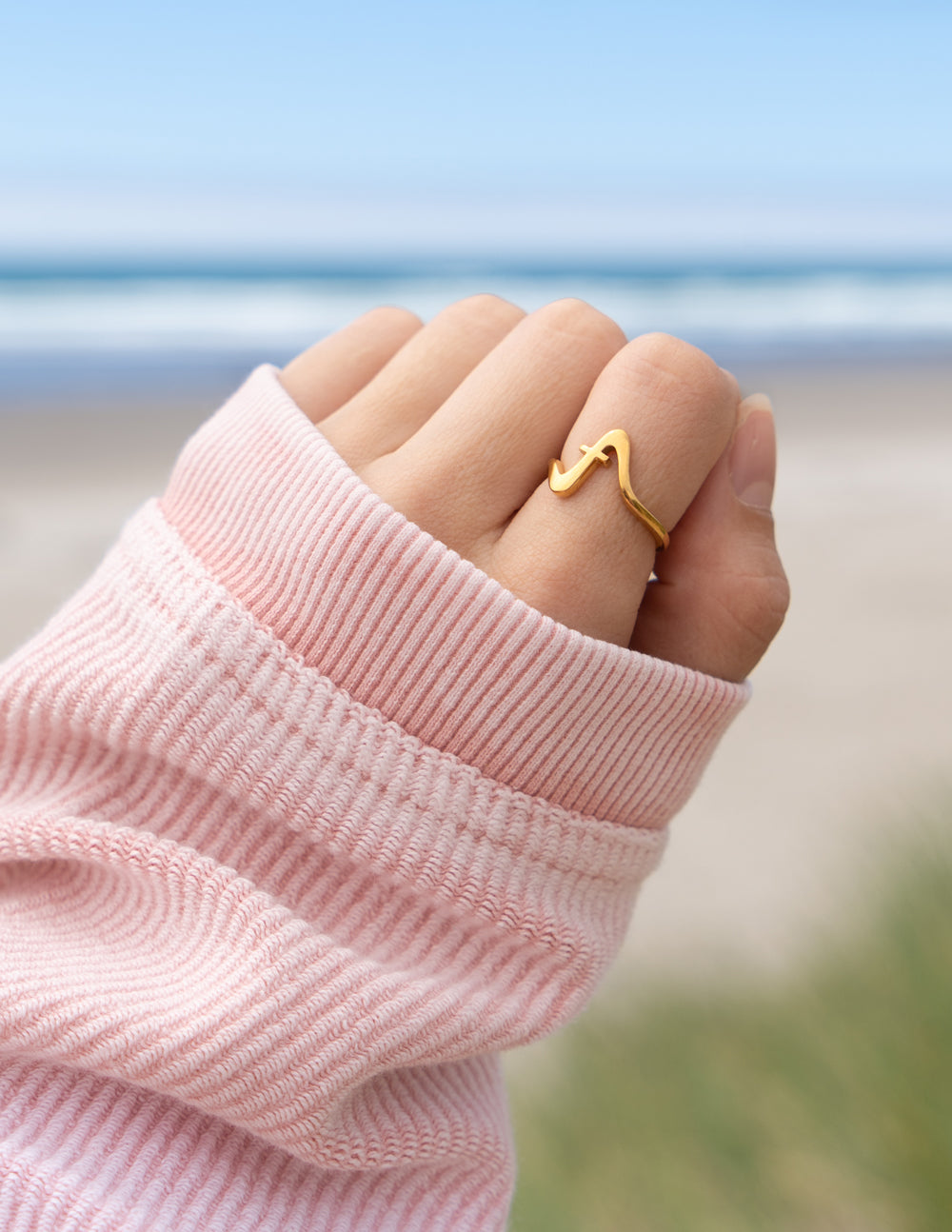Gold wave ring from Elevated Faith, perfect piece of Christian jewelry for everyday wear