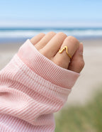 Gold wave ring from Elevated Faith, perfect piece of Christian jewelry for everyday wear