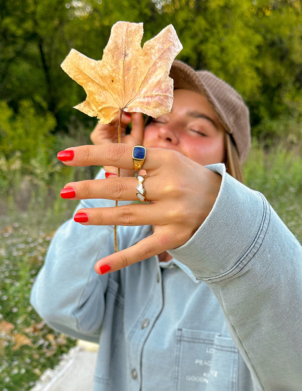 Elevated Faith ring featuring blue stone, perfect accessory for Christian jewelry enthusiasts