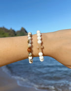 Elevated Faith Christian Jewelry Bracelet featuring a cross design and natural stone beads