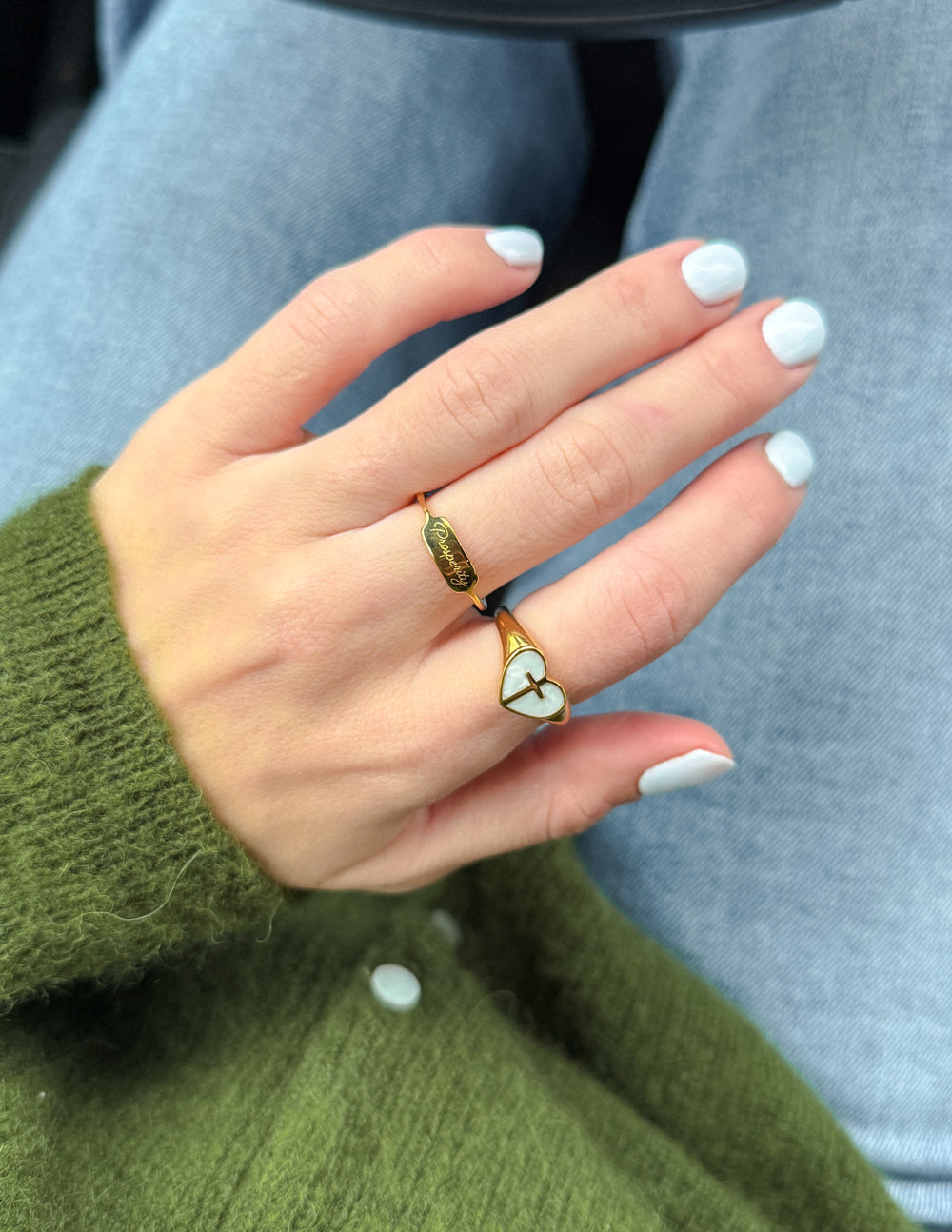 Elevated Faith Christian Jewelry Ring with Heart and Cross Design on Elegant Hand