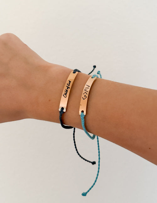 Elevated Faith Christian Jewelry Bracelet in blue and black with engraved messages on metal tags
