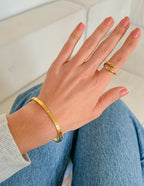 Elevated Faith Gold Ring on Model's Hand as Part of Elegant Christian Jewelry Collection
