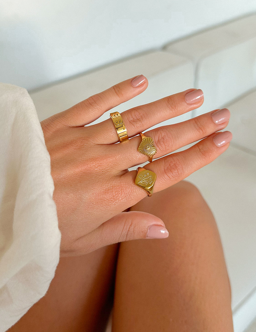 Stylish Elevated Faith rings stacked on fingers, perfect for Christian Jewelry lovers