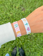 Elevated Faith Christian Jewelry Bracelet set featuring colorful patterns and symbols of faith