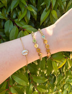Elevated Faith Christian Jewelry Bracelet featuring gold letters and a stylish design on a wrist
