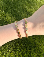 Elevated Faith Christian Jewelry Bracelet with gold letters spelling faith on a beaded design