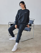 Elevated Faith Christian Crewneck Sweatshirt in dark grey, paired with matching joggers for a stylish look