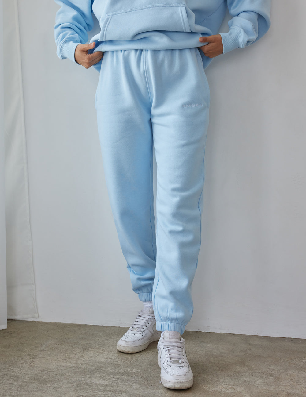 Light blue sweatpants from Elevated Faith, perfect for casual wear, part of Christian Apparel collection