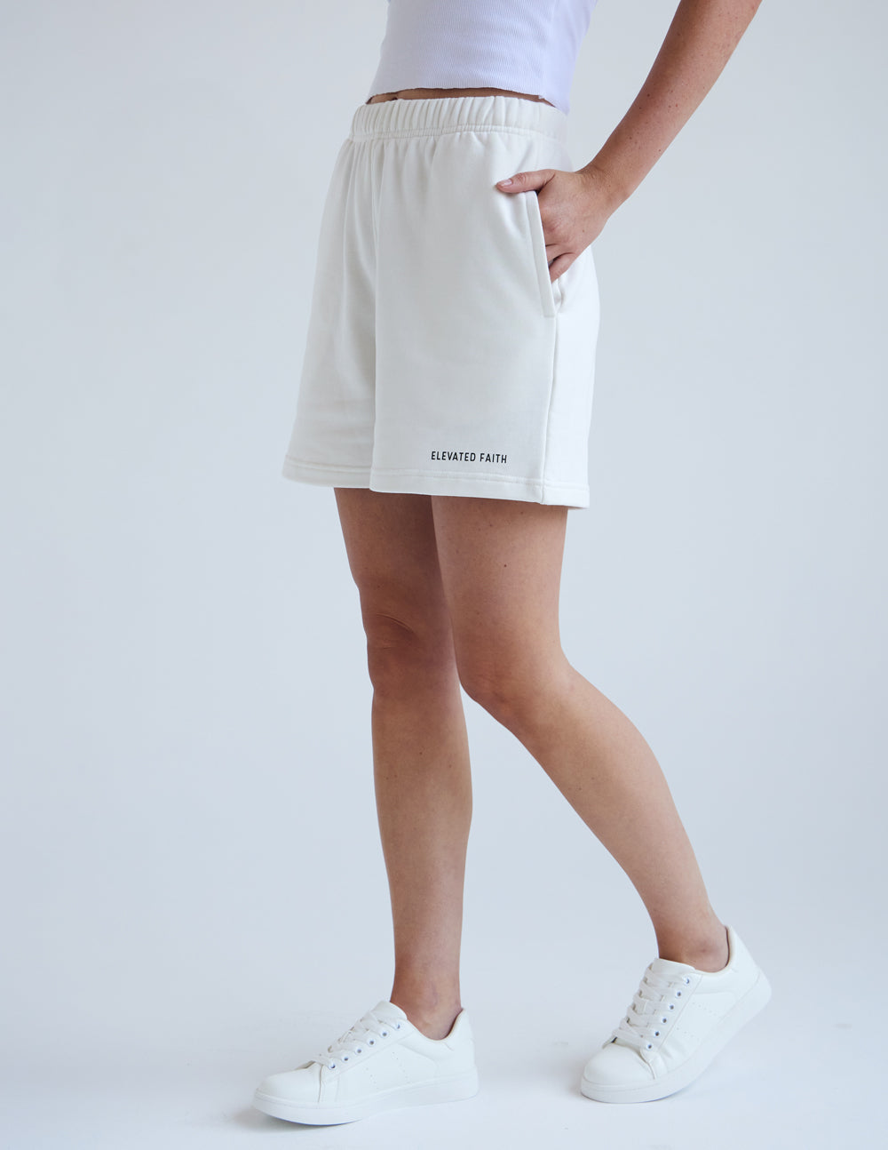 Elevated Faith Christian Shorts in white with side pockets for comfort and style