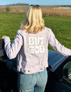 Elevated Faith Christian Jacket in light purple with 'But God' printed on the back for stylish faith expression