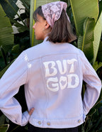 Elevated Faith Christian Jacket in light blue with bold 'But God' graphic on the back