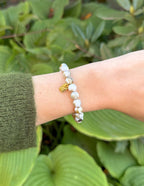 Elevated Faith Christian Jewelry Bracelet with Stone Beads and Gold Accent, worn on a wrist