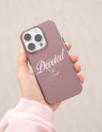 Elevated Faith Christian iPhone Case with a bird design and the word Devoted