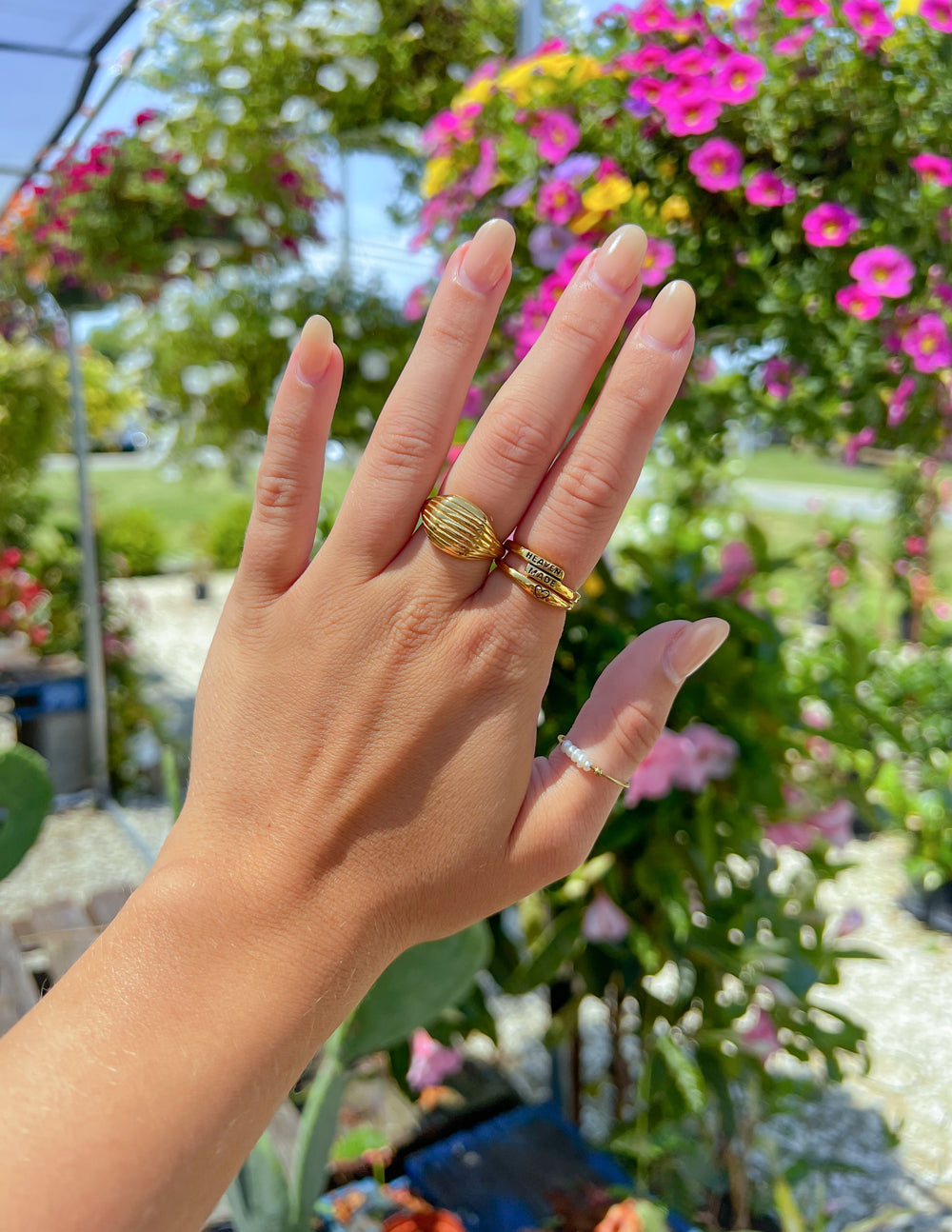 Gold Elevated Faith Rings showcased on a hand, perfect for adding elegance to Christian Jewelry collections