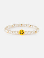 Elevated Faith Christian Jewelry Bracelet with white pearls and a yellow smiley face charm