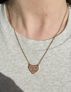 Elevated Faith Let Go Heart Necklace in Gold, a piece of Christian Jewelry for spiritual wearers
