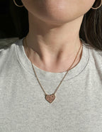 Elevated Faith Heart Necklace featuring the inscription 'Let Go' as a piece of Christian Jewelry