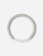 Elevated Faith Christian Jewelry Bracelet with white letter beads spelling FRGVN on a grey beaded band