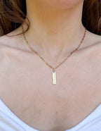 Elevated Faith Gold Necklace featuring a vertical pendant as Christian Jewelry for daily inspiration