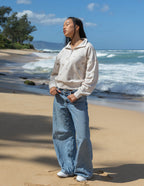 Elevated Faith Christian Jacket in light color with a cozy design, perfect for casual outings by the beach