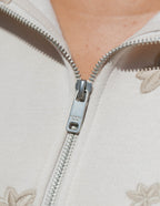 Elevated Faith Christian Jacket featuring a silver zipper and floral embroidery detail