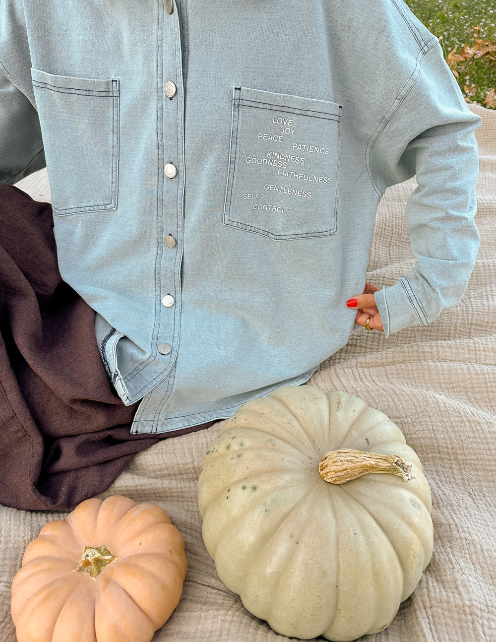 Elevated Faith Christian Jacket in light blue with inspirational text and button-up design