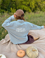 Elevated Faith Christian Jacket in light blue featuring 'Fruit of the Spirit' printed on the back