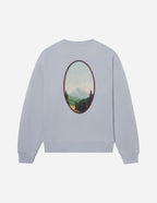 Elevated Faith Christian Crewneck Sweatshirt in light blue featuring a scenic mountain graphic on the back