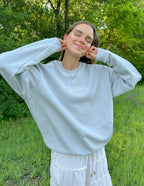 Light gray Christian Crewneck Sweatshirt featuring the text 'God is here' for casual wear