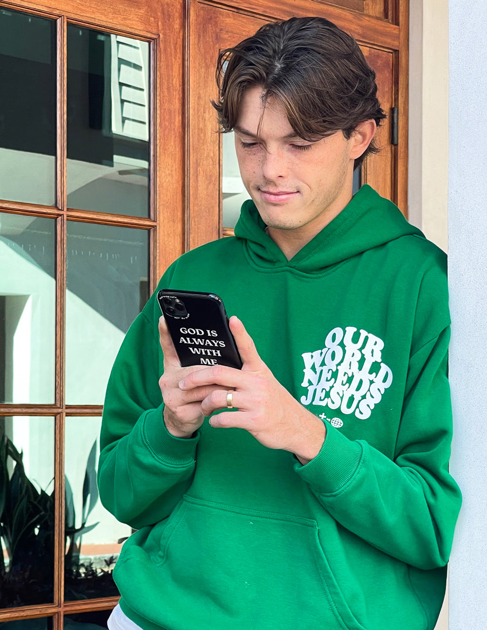 Christian iPhone Case featuring the text God is Always with Me, designed for daily inspiration