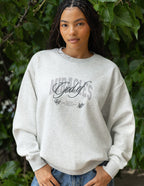 Elevated Faith Christian Crewneck Sweatshirt in light gray with 'Miracles of God' graphic design