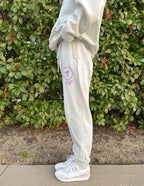 Elevated Faith Light Green Sweatpants featuring a logo, perfect for Christian Apparel enthusiasts