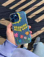 Christian iPhone Case featuring colorful flowers and the phrase Growing With God for inspiration