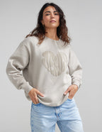 Elevated Faith Christian Crewneck Sweatshirt in beige with heart design and relaxed fit