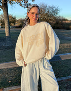 Elevated Faith Christian Crewneck Sweatshirt in cream featuring Heart of God design for relaxed wear