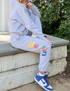 Elevated Faith Grey Sweatpants featuring colorful lettering, perfect for Christian Apparel lovers
