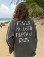 Elevated Faith Christian Jacket featuring 'Heaven is Closer Than You Know' text on the back