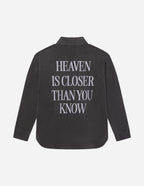 Elevated Faith Christian Jacket in dark color featuring the message Heaven is Closer Than You Know on the back