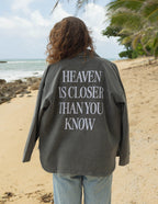 Elevated Faith Christian Jacket with the message Heaven is Closer Than You Know printed on the back